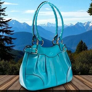 Patricia Nash Turquoise Blue Handbag from the Discovery Collection Mona Satchel